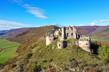 Fototapeta na wymiar Aerial autumn view of the castle in the village of Turna nad Bodvou in Slovakia