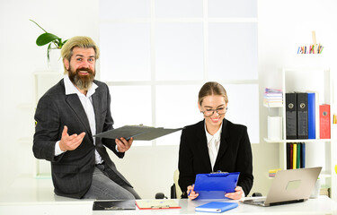 Couple work in office. Law consultation. Man and woman boss manager director. Subordination and teamwork. Business report. Colleagues communication. Successful business. Business couple working