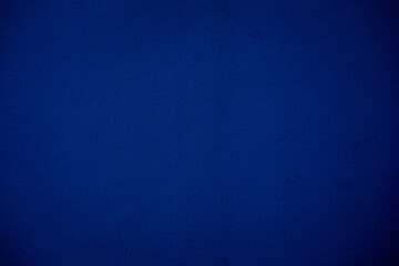 Abstract grunge decor. Beautiful dark blue stucco wall background. Space for designing and inserting text.