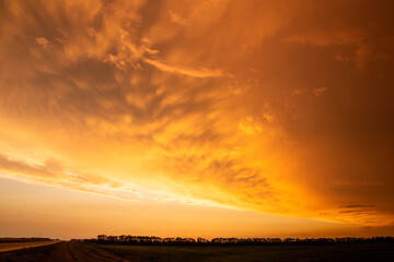 Fototapeta na wymiar Prairie Storm Clouds Sunset