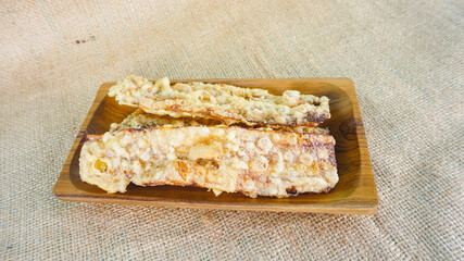 Indonesian traditional snack called 'Sale Pisang'.  This food is made from sliced ​​bananas then fried with flour wrapping.