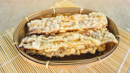 Homemade Indonesia snack banana chips (dried banana slices and wrapped by flour). This snack tastes sweet and delicious