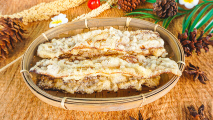 Close up of dried bananas 'Sale Pisang' on woven bamboo. selective focus shoot