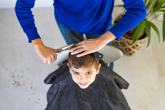 Funny Boy Getting Haircut At Home With Scissors