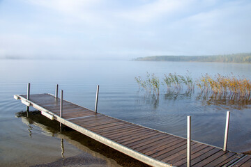 Obraz premium Sunrise Northern Lake Dock