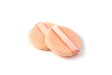 Two powder Sponges on a white background with space to copy. The view from the side.