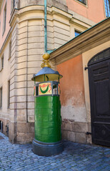 Old historical pissoir, or urinal toilet, installed in 1890 close to the Royal Palace at Gamla...