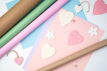 Pink heart on a pink and blue background. Top view, with space to copy.