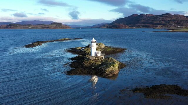 Aerial view of Sager Bhuidhe&nbsp;Lighthouse, loch linnhe and offshore islands on the west coast of the argyll region of the highlands of Scotland during winter