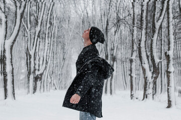 boy in winter forest