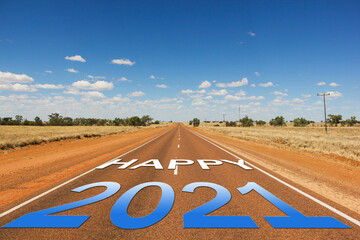 Happy 2021 blue and white gradient text on empty road in Outback Australia desert. Way to new projects for future, travel concepts