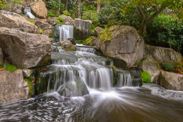 waterfall in the forest, London, Kyoto gardens, Holland park.