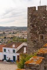 Fototapeta na wymiar Traditional houses and castle on the Alentejo village of Terena, in Portugal