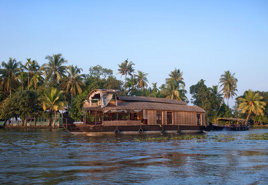 Indian houseboat floating in backwaters in Alleppey, Kerala state, South India