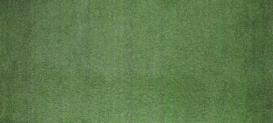 Fototapeta premium dark background of artificial green sports turf