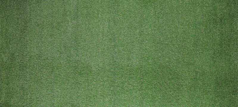 dark background of artificial green sports turf