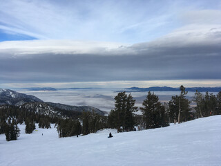 Fototapeta na wymiar Carson valley views from a ski resort on a cloudy winter day in Tahoe