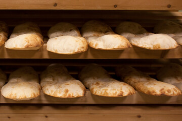 Lavash, Bakery Products fresh pastry sells pita market wheat tortillas close-up Caucasian kitchen Lavash Pita or Arabic bread traditional healthy eastern Georgian flatbreads paper bags country Georgi