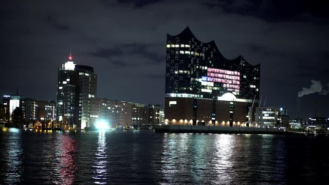 Skyline of Hamburg by night with Elbphilharmonie concert hall - travel photography by night