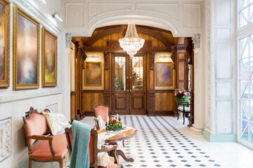 New Year's decoration of a gorgeous living room in a luxury classic style