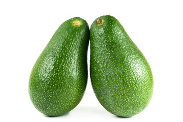 Two green avocado closeup on a white background
