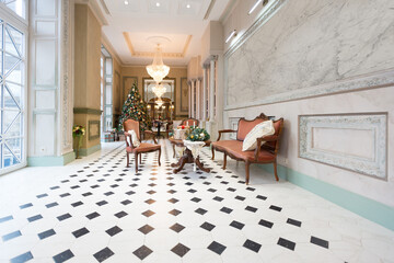 New Year's decoration of a gorgeous living room in a luxury classic style