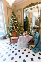 New Year's decoration of a gorgeous living room in a luxury classic style