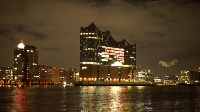Beautiful harbour of Hamburg with Elbphilharmonie concert hall by night - travel photography by night