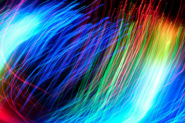 Abstract motion curved lights on dark background