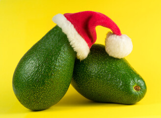 two fresh avoado on yellow background