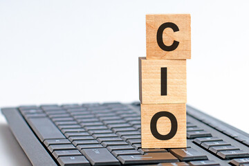 CIO - acronym from wooden blocks with letters, concept. CIO - Chief Information Officer