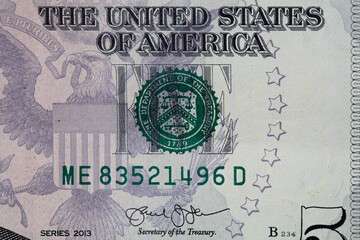 fragment of 5 dollar bill for design purpose