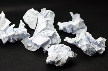 A few crumpled pieces of white paper
