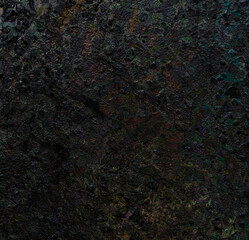 Macro photo of dirty and smudgy baking plate, top view - empty black tray surface.