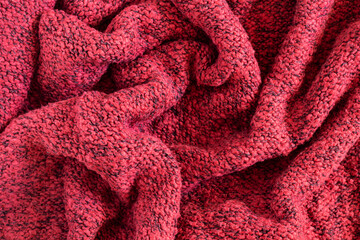 Fototapeta na wymiar Warm red sweater fabric texture. Melange