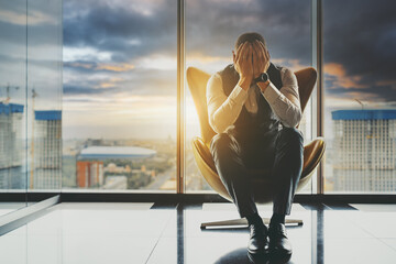 A stricken with grief man entrepreneur is going through the bankruptcy of his business; a sorrowful...