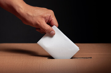 hispanic choosing their vote in latin american political elections on a black background