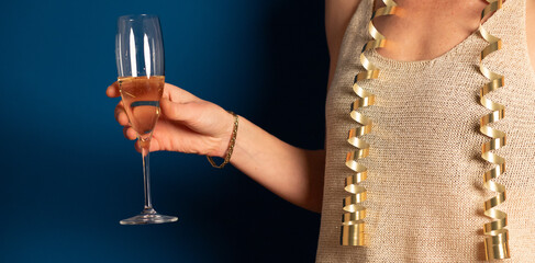 woman holding champagne glass New Year's eve party