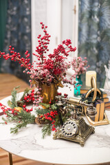 Christmas decoration on the table with vintage telephone 
