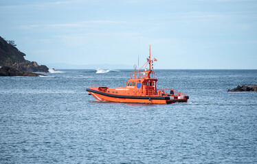 maritime rescue boat leaving the port