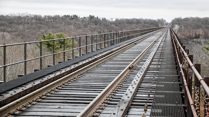 Empty railway bridge and train tracks