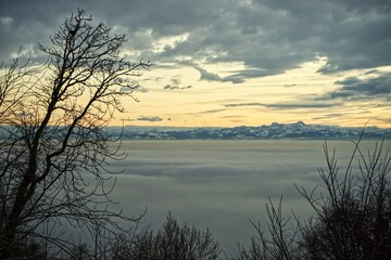 sunset over lake of fog