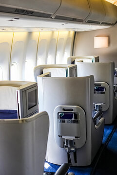 A Vertical Shot Of An Airplane's Business Class Cabin