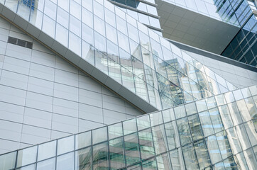 Modern architecture of a glass exterior escalator 
Electric stairwell enclosed within glass modules
