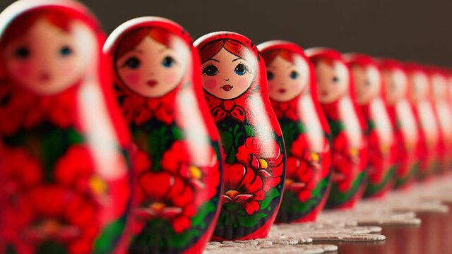Beautiful matryoshka dolls in a row. An infinite number of babushkas on a doily.