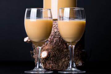 egg liqueur in a glass on wood