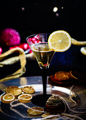 glass of champagne and coins