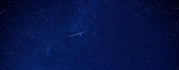 Panorama night blue sky,star meteor and star  background.with grain and select white balance.