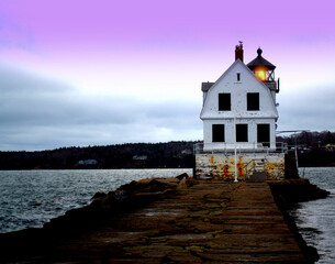 Rockland Breakwater Lighthouse,  Located in the middle of Rockland Harbor.  There is about a one mile walk out to the lighthouse on the rocks.  Located Rockland Maine, USA
