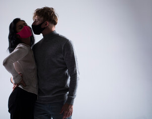 Love couple. Mask. Couple in love. Studio photo. Sensual. Romantic lovers. 